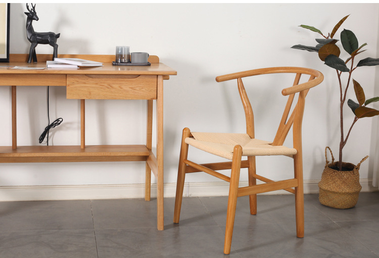 affordable dining chair with curved back and minimalist design