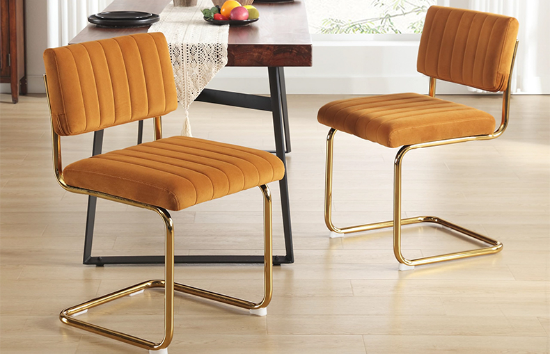 Contemporary velvet dining chair with armrests