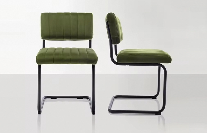 Close-up of velvet upholstered dining chair seat