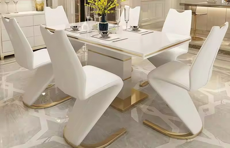 side angle of leather and metal dining chair